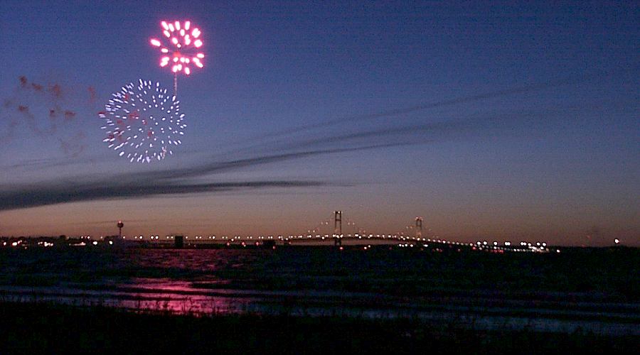 Mackinac Bridge at night with fireworks