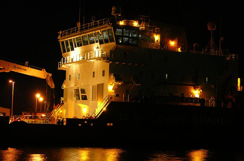 Coast Guard Cutter Mackinaw at night in the Cheboygan RIver