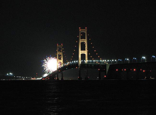 Fireworks next to the Mackinac Bridge
