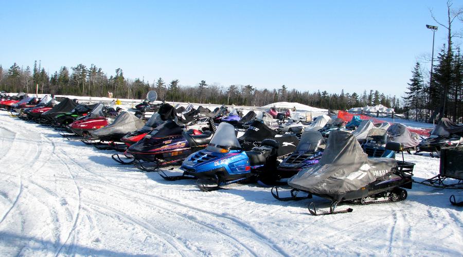 Snowmobiles parked at the Mackinac Island airport.