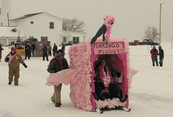 Pink flamingo outhouse