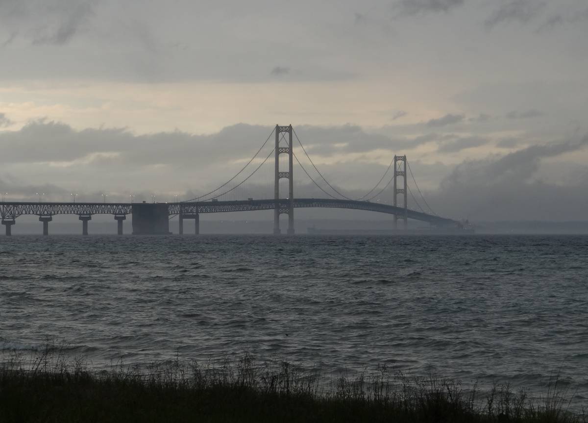 Freighter passes under the Mackinac Bridge 2012