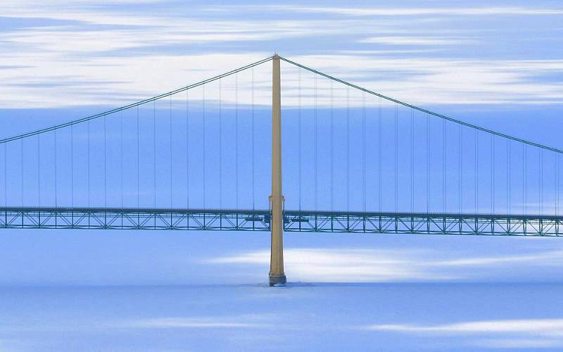 Mackinac Bridge tower with winter ice