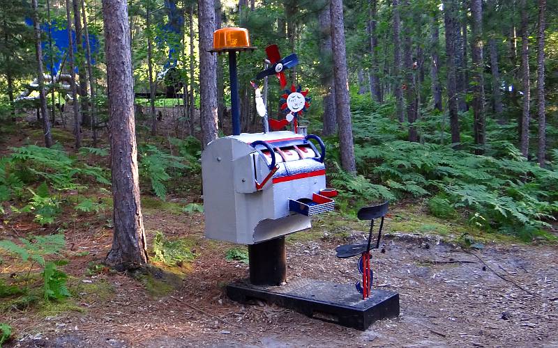 slot machine sculpture in the woods