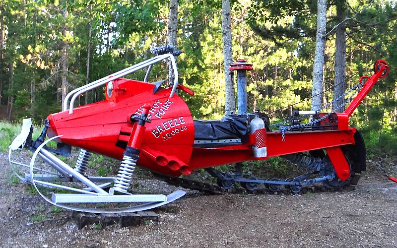 scrap metal folk art snowmobile sculpture