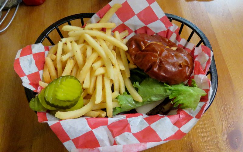 Mushroom Swiss burger and fries - Chuckwagon Restaurant