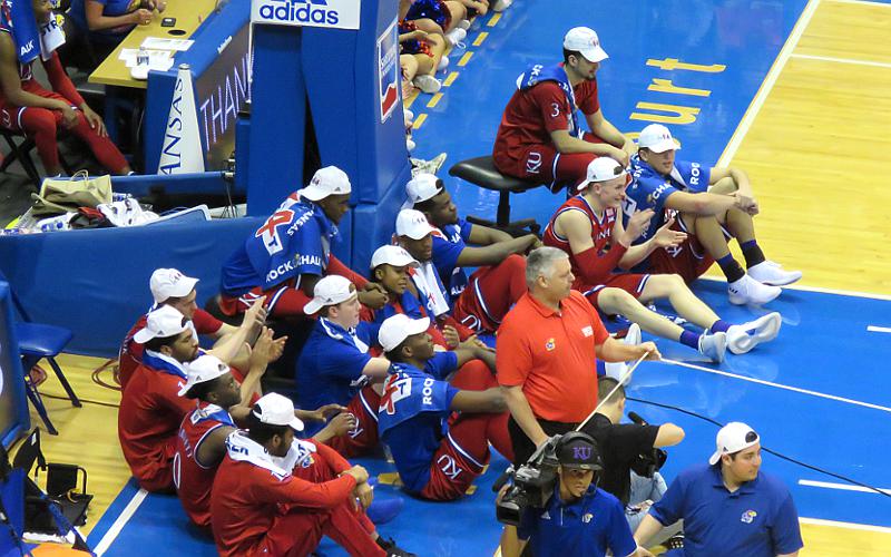 KU Jayhawks basketball players listenign to senior speeches