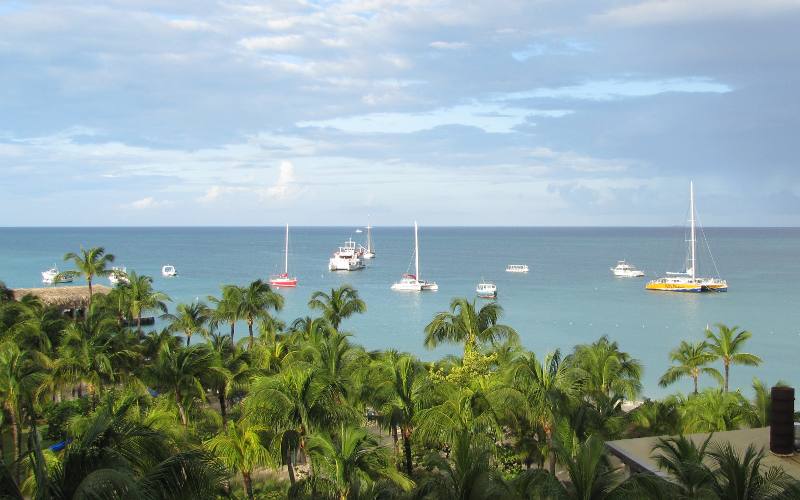 Boats floating off Palm Beach in Aruba