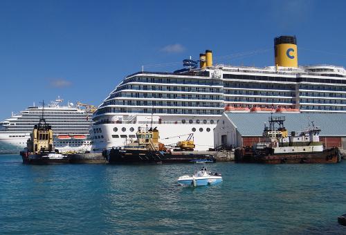 Tugboats and cruise ships in the Nassau, Bahama harbor