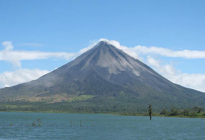 Arenal Volcano erupting during Bike Arenal tour.