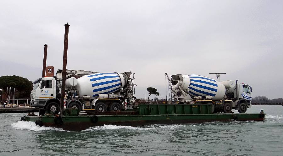 Cement trucks on a barge - Venice, Italy