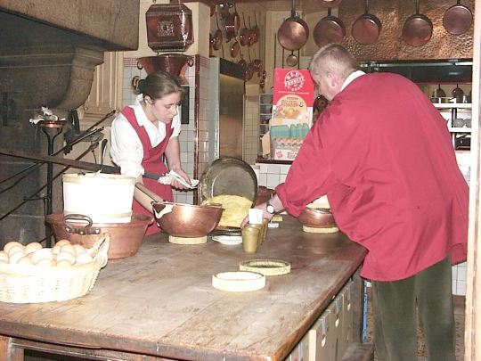 making omelets at Mere Pollard on Mont St. Michel