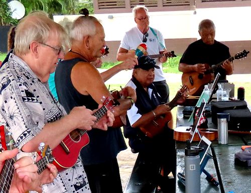 Ukulele players at Poipu Beach shelter