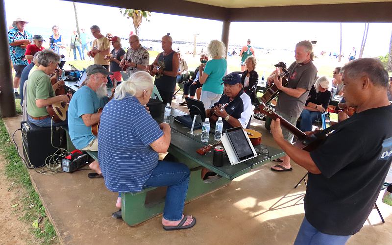 Ukulele players at Poipu Beach shelter