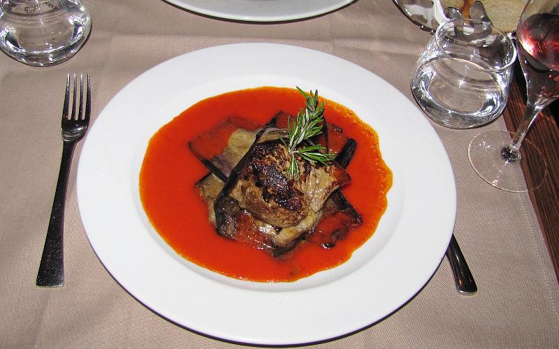 Medallion of veal with eggplants and Pamesan with pepper coulis