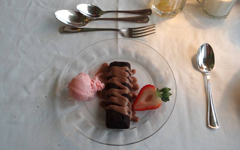 chocolate brownie with espresso sauce and black cherry ice cream