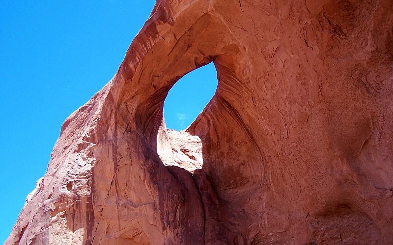 Eye of the Sun natural arch in Monument Valley