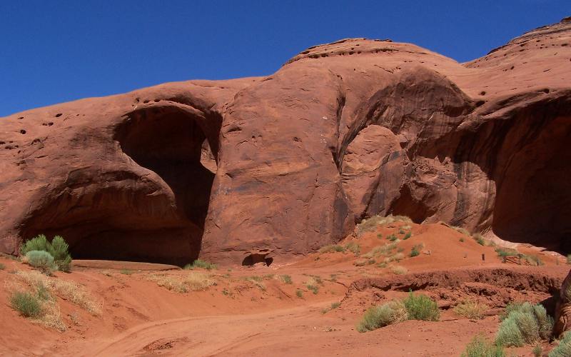 Moccasin Arch and Big Hogan Arch in Monument Valley