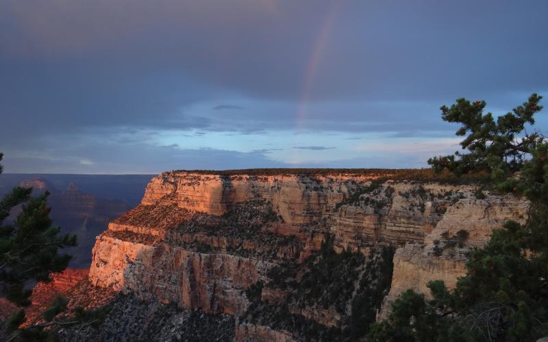 Grand Canyon rainbow with blue sky