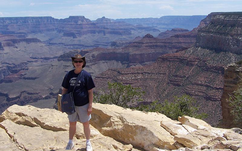 Nancy Lipp on the lip of the Grand Canyon